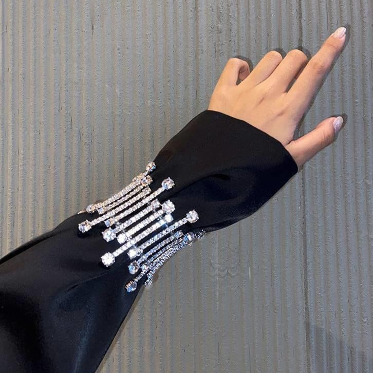 Alandis Asteroid Crystal Bracelet worn with long sleeve jacket